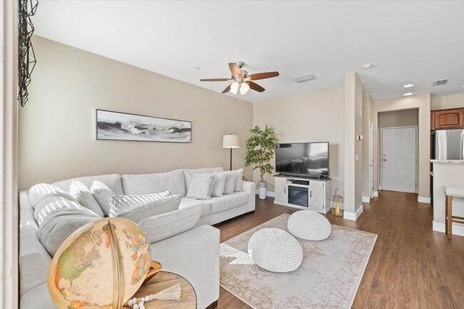 Living Room with Electric Fireplace Cabinetry - 807 Esplanade Cir