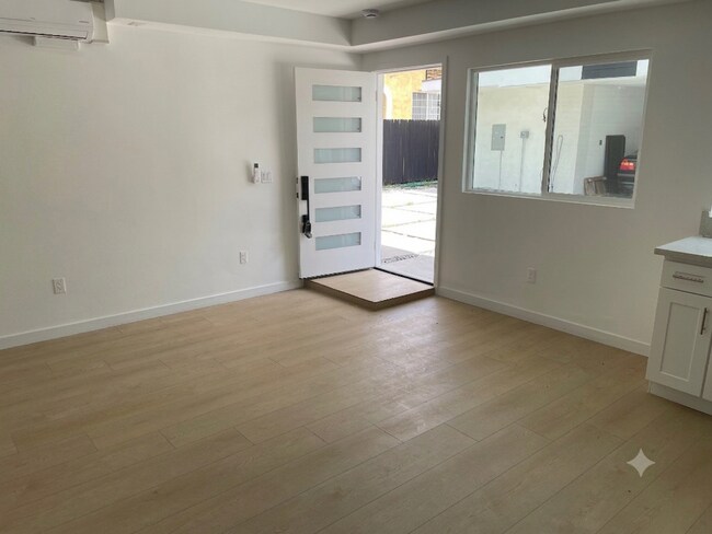 Building Photo - 1 Month Free!Brand New Thai Town Studio w/ All Utilities Included!