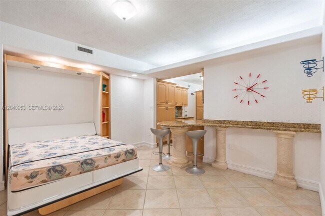 Building Photo - 10185 Collins Ave