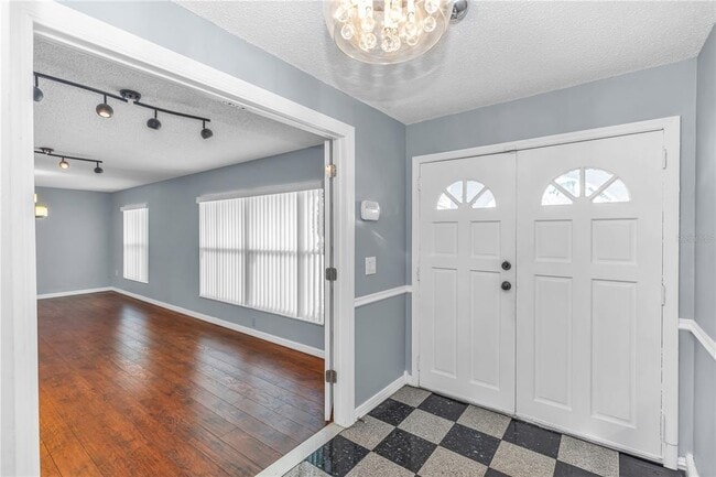 Building Photo - 8315 Village Green Rd