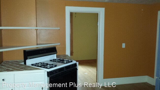 Building Photo - 3 br, 1 bath House - 104 Longs Peak Ave