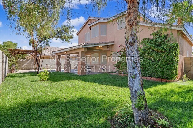 Building Photo - NW!! 4 bedrooms!! Bed & Bath DownStairs!!! RV Parking!!! Synthetic Grass Front yard!! Real Grass ...