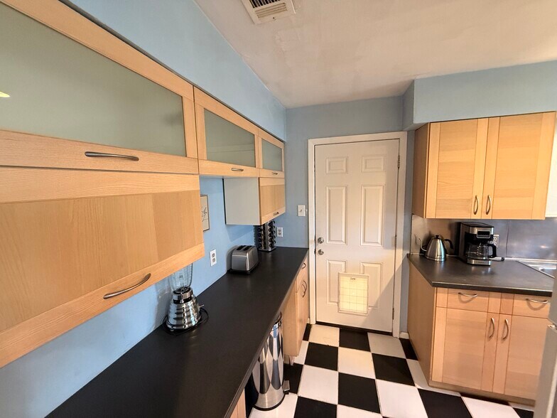 Kitchen backdoor (doggy door) - 3202 Locke Ln