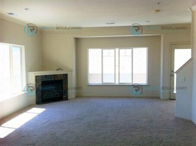Building Photo - Stunning 3-Bedroom Townhome with Panoramic City Views, Upgraded Kitchen & Spacious Living in Nort...