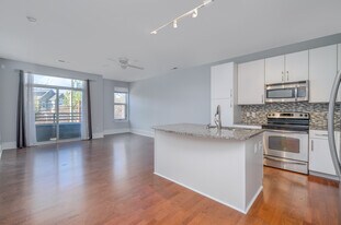 From the dining area looking at the living room, balcony, and kitchen - 1600 Fulton Ave