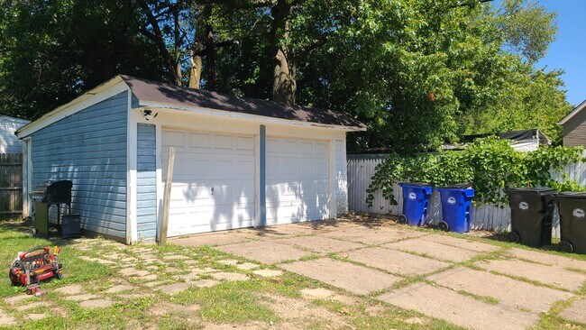 Right side of driveway and garage is reserved for upstairs tenant. Street parking also available. - 3737 W 135th St
