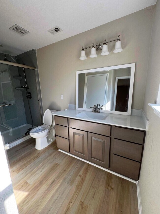 Building Photo - NEW PAINT, FLOORING, APPLIANCES & ROOF  | ...