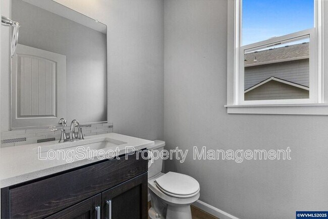 Building Photo - 7177 SE Sarah Dr