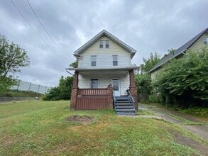 Building Photo - Bright 3BR Single-Family in East Akron — Y...
