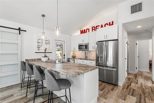Building Photo - Coastal Luxury Living Just Minutes from Madeira Beach - 3bed | 2 bath