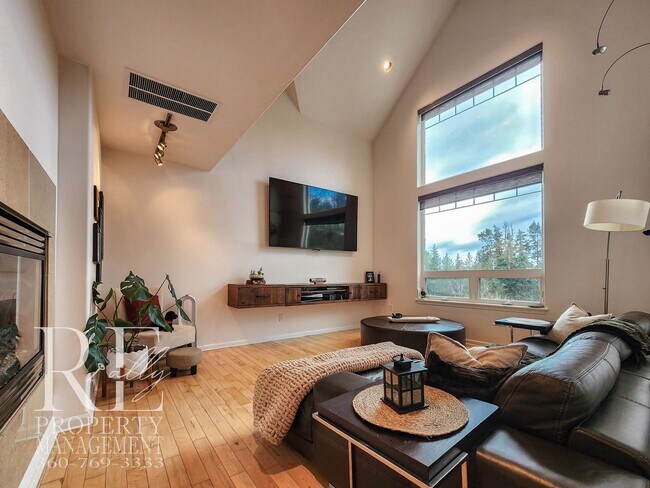 Building Photo - Light-Filled View Home with Vaulted Ceilings & Warm Wood Finishes