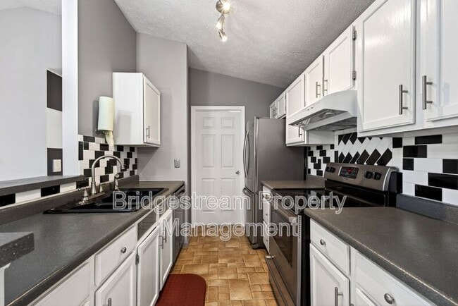 Building Photo - 6591 Brigham Sq