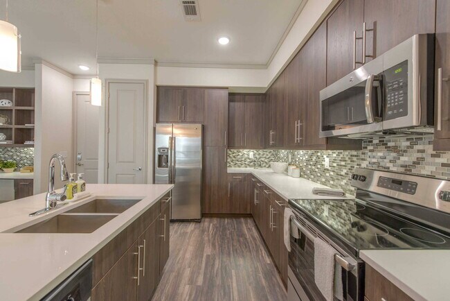 Building Photo - Experience the Art of Fine Apartment Living!