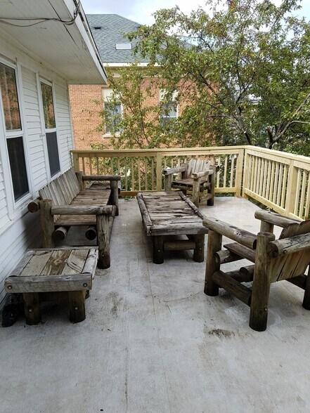 Enjoy the outdoors with the 2nd floor deck off one of the upstairs bedrooms - 106 SE 2nd Ave