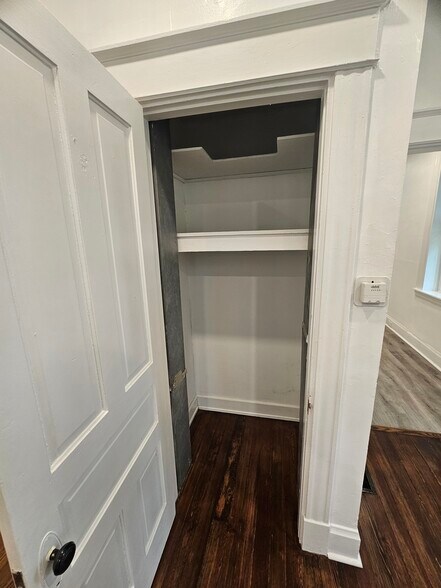 Family room/bedroom closet. - 3914 S Madison Ave