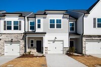 Building Photo - Luxurious 3-Bedroom Townhome Living in the...