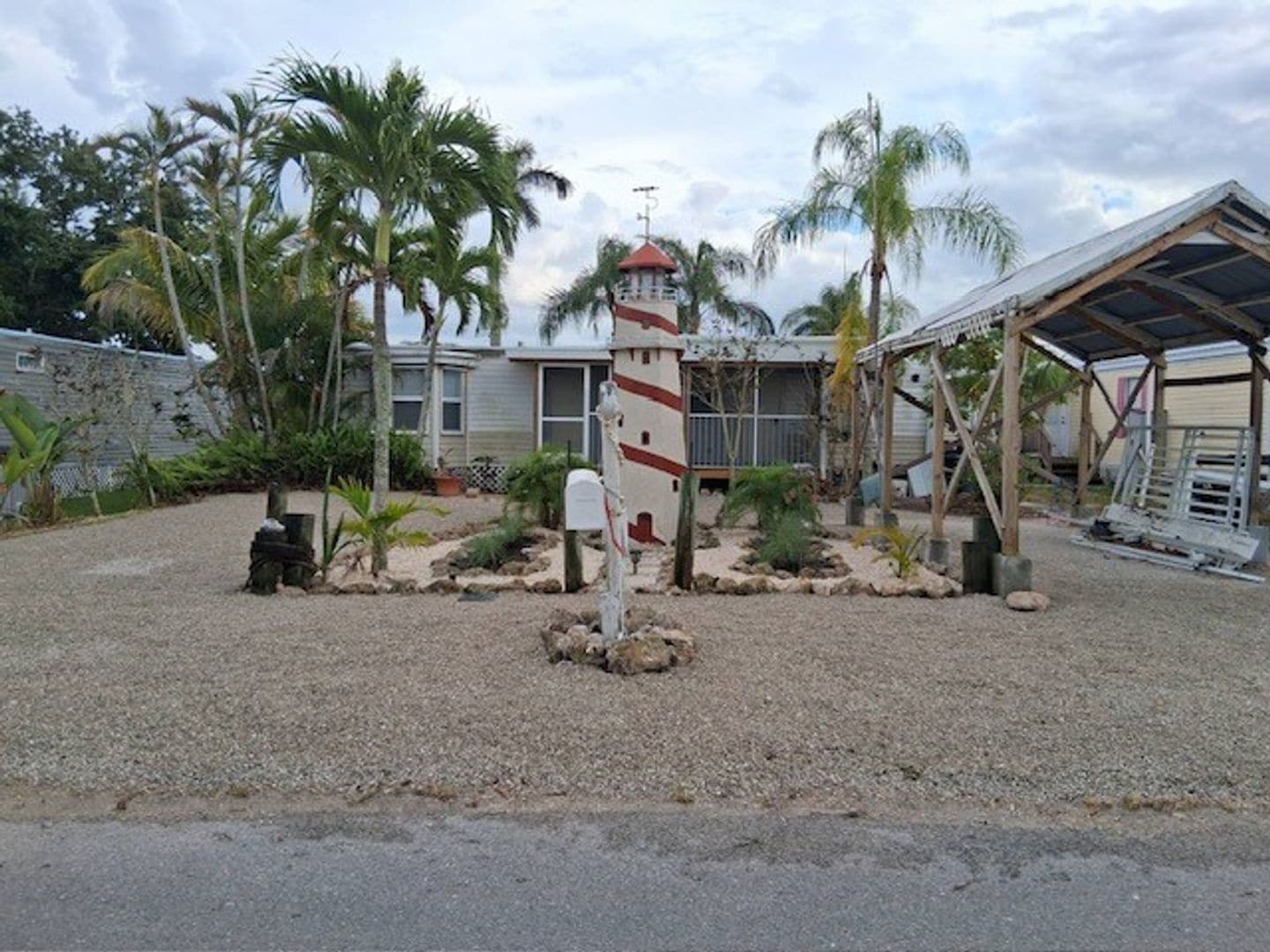 Building Photo - COMING EARLY JUNE: ISLAND LIVING IN BOKEELIA: 1 BD / 1.5 BR Front Screened Lanai