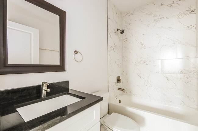 Building Photo - "Charming 3-Bed, 2-Bath Duplex on Broad Ripple Ave – Spacious 1250 Sq. Ft. Living in Vibrant Indi...