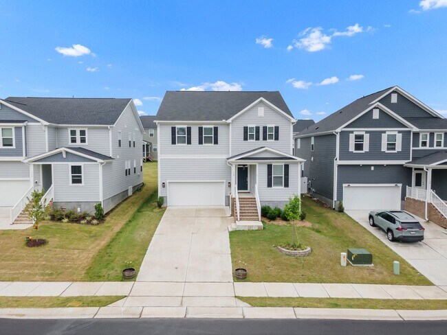 Building Photo - Spacious 5-Bedroom Home with Modern Upgrad...