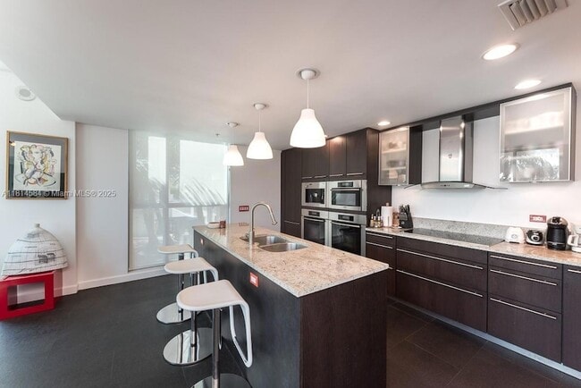 Building Photo - 3801 Collins Ave