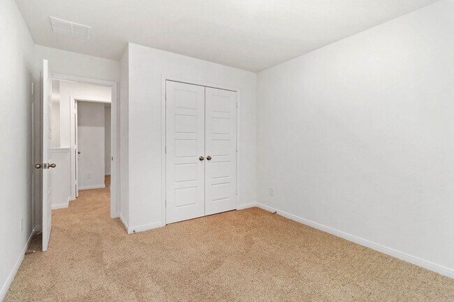 Building Photo - Brand New 4BR Home | Primary Suite Downstairs & Private Yard