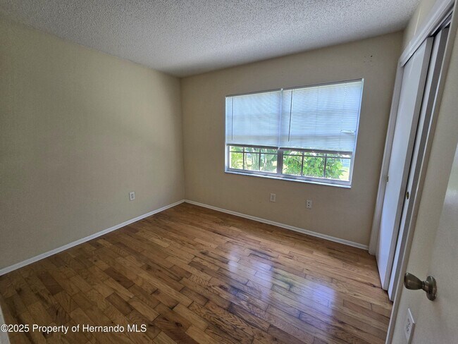 Building Photo - 8915 Woodmill Dr