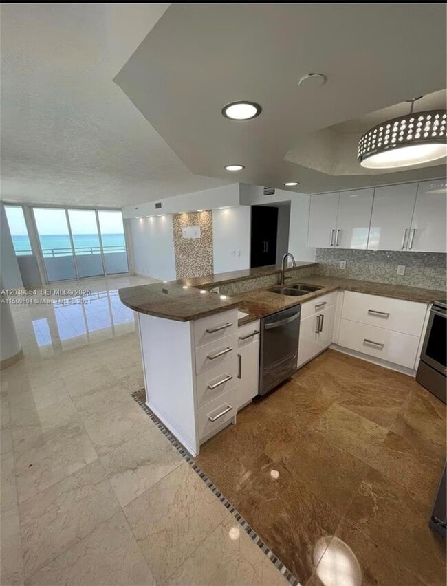 Building Photo - 8911 Collins Ave