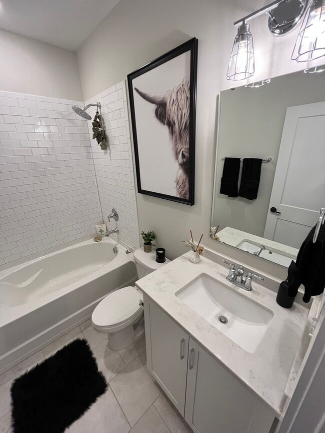 Building Photo - Stunning 2BD*, 3.5BA Raleigh Townhome with Bonus Office/Den on First Floor and 2-Car Attached Garage