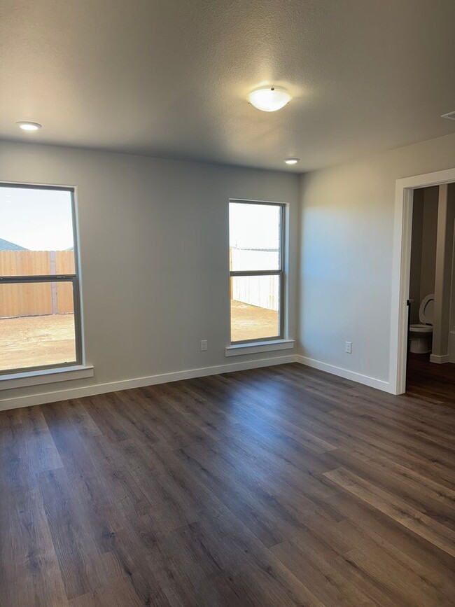 Building Photo - Brand New Construction 3/2/2  1/2 off spec...