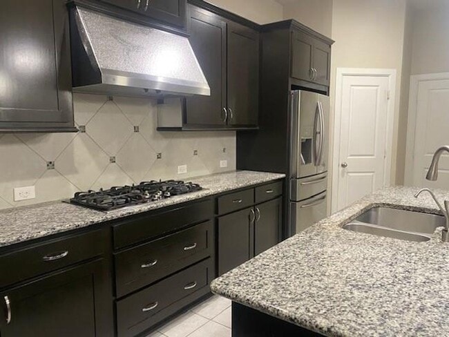 Building Photo - Breathtaking 4-bedroom home in the highly ...