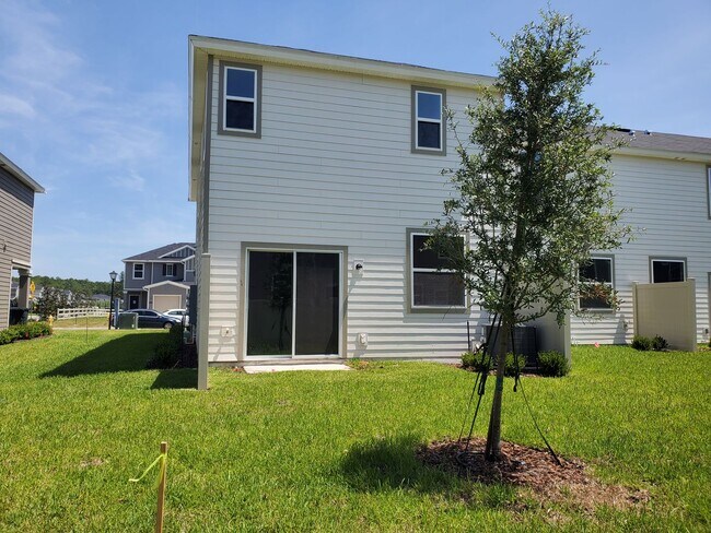 Building Photo - 3 Bed 2.5 Bath with Garage in the newly de...
