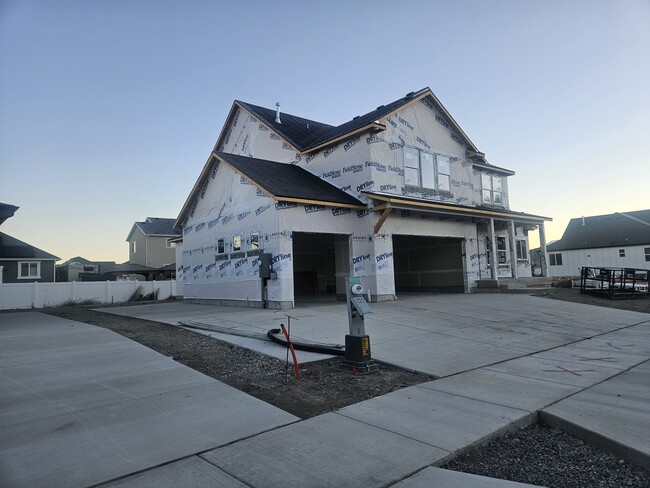 Side of home showing parking area for ADU - 895 E Antelope Dr