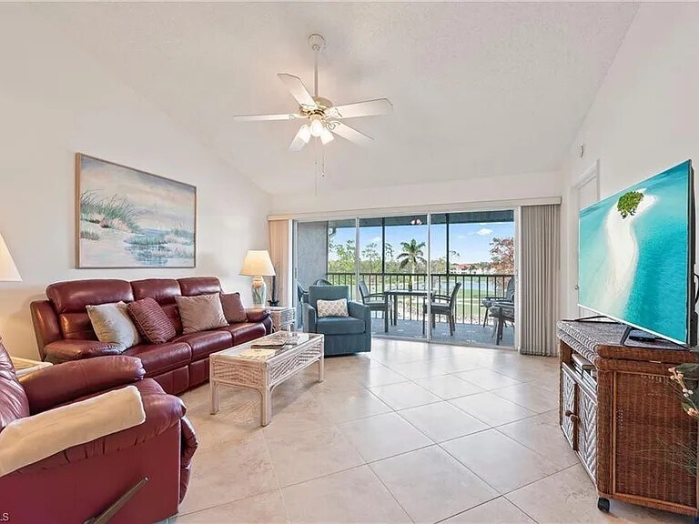 Living Room with golf course view - 7065 Dennis Cir