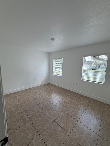 Building Photo - 1702 W Dempsey Ave