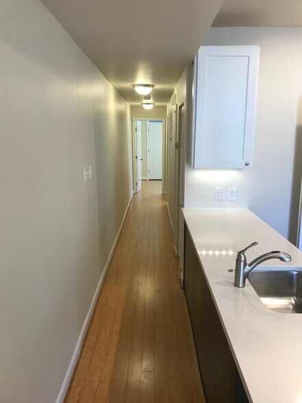 Hall to bedrooms and bathroom - 1448 Newton St NW