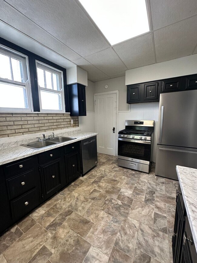 Building Photo - WESTWOOD - Charming 3bd Tudor w modern updates