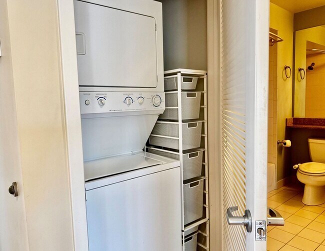 Building Photo - Corner Light. City Energy. Zero Compromise.