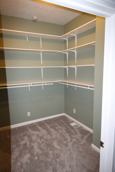 Huge walk-in master closet with rods, shelving and hooks - 4536 Leo Street