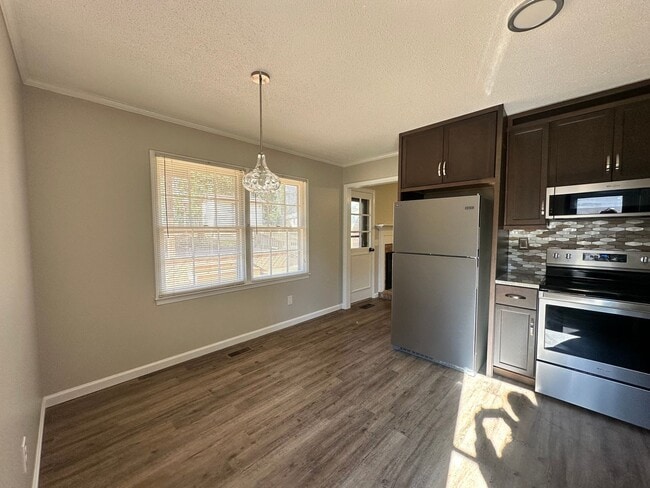 Building Photo - Adorable 3-Bedroom Home in the Heart of Cary with an Amazing Outdoor Space + Fenced Backyard!