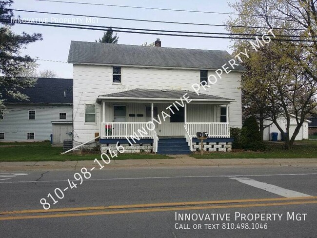 Primary Photo - Swartz Creek Duplex plus oversized garage/...