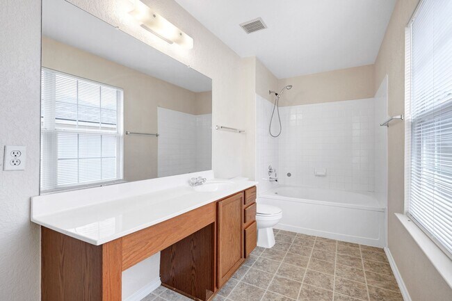 Building Photo - Spacious Brick-Front Home with Loft and Ex...