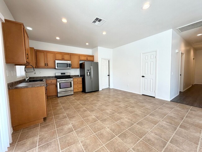 Building Photo - Energy Efficient 5 Bedroom Home with Paid Solar & Covered Patio