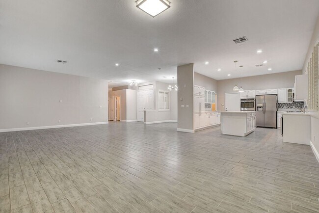 Building Photo - 4 bedroom, 3-bath home with a Pool!