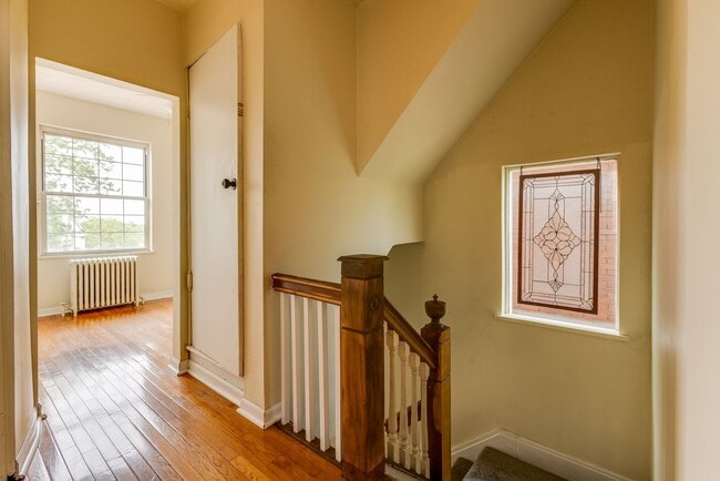 Building Photo - AVAILABLE June 2026 - Beautiful 4 Bedroom, 2 Bath Home w/ Front Porch Swing!