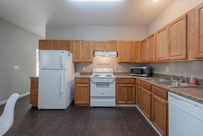 Building Photo - The Gun Club | Make yourself at home in this West-Side Reservoir Park Home, a 5-minute walk to bu...