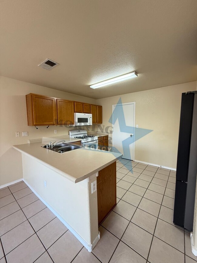 Building Photo - JUST REDUCED - 4-Bedroom Home!