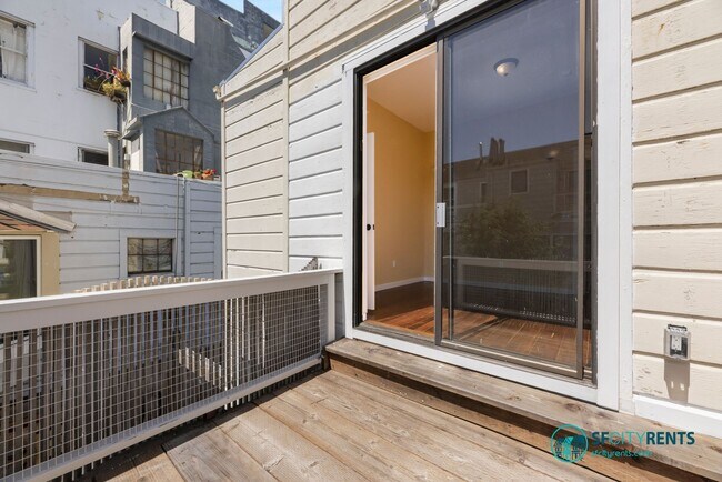 Building Photo - Intimate Luxury Space w/ Chef's Kitchen, 2 New Baths; Private Deck Overlooks Zen Courtyard