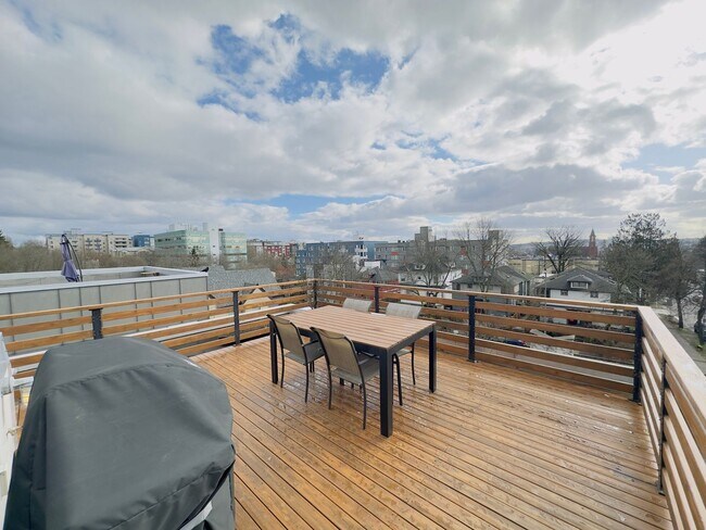 Building Photo - 3 Bedroom Central District Townhome w/ Garage, AC & Rooftop Deck