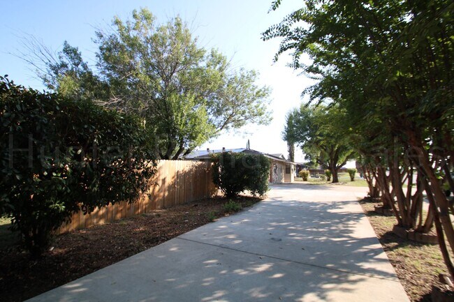 Building Photo - Spacious 4-Bedroom Home with Bonus Room, Large Yard & Solar Panels