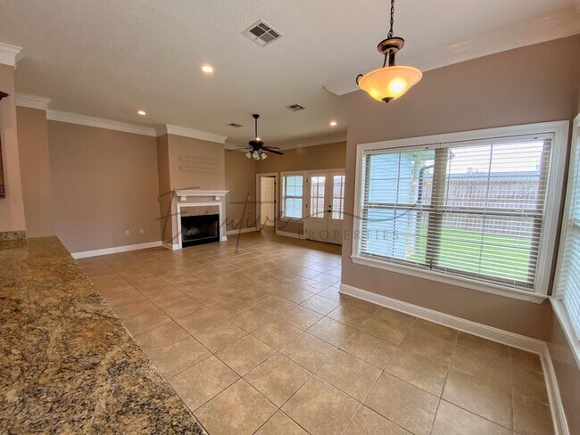 Building Photo - Family Home in Lafitte Landing – Fenced Ya...